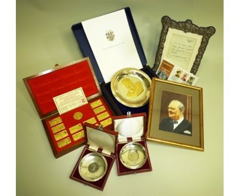 A WINSTON CHURCHILL COLLECTION comprising;- a limited edition Collector's Plate with gilded portrait, cased, two silver Crown