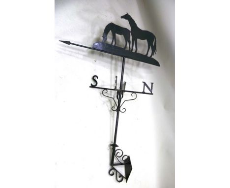 A WROUGHT IRON WEATHER VANE, pierced horse and foal pointer, with mounting frame marked with the points of the compass, point