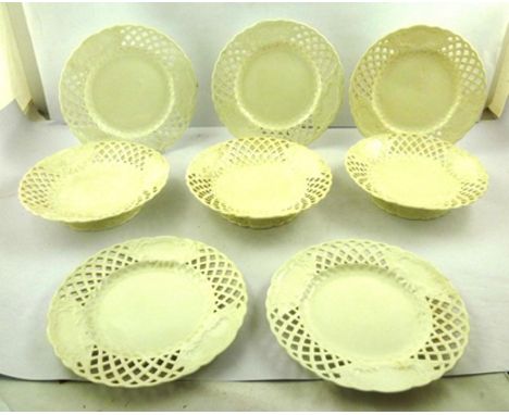 A "MINTONS" PART BLANC DE CHINE DESSERT SERVICE with reticulated rims, comprising five 24.5cm plates and three 23cm low compo