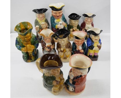 A large collection of Toby jugs, includes Royal Doulton 'Happy John', Tony Wood, Burlington Ware, Sylvac, and others. Three b