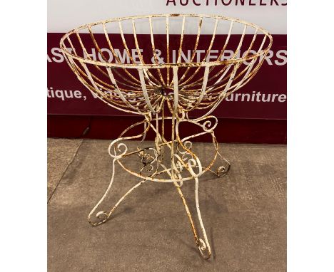 A mid 20th Century large wrought iron circular garden planter, 91cm tall, 80cm wide