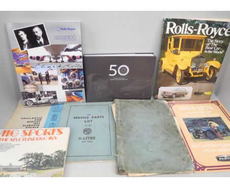 A collection of motoring memorabilia includes MG Manual 1937, 50 years of Daimler and Rolls Royce books