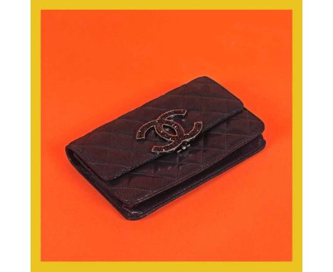   Chanel vintage clutch, quilted leather, with bright accents, accompanied by authenticity card and original box Chanel vinta
