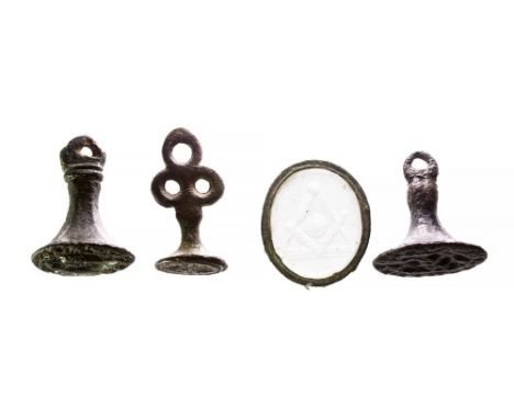 Seal Matrix Group (4).Two medieval 'chessman' type seal matrices, one with a device of a squirrel and leaf, the other with a 