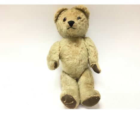 A vintage teddy bear. Approximately 18 inches tall. Postage B