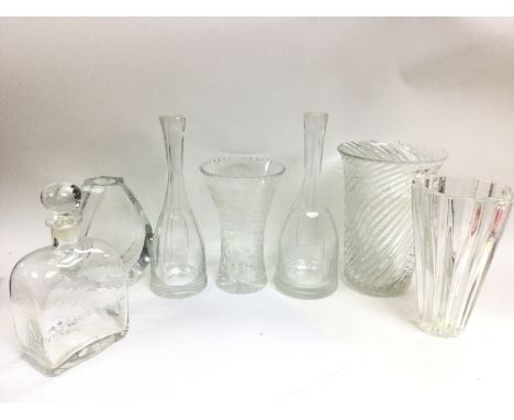 A collection of cut glass vases including Atlantis, Baccarat and others. 18 to 29cm tall. This lot cannot be posted. NO RESER