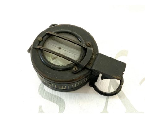 A military issue compass with marks for T.G Co Ltd , No.B 283212, 1944 MKIII