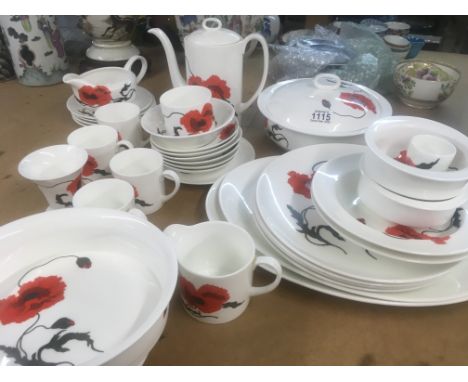 A Susie cooper for Wedgwood tea dinner service decorated in the corn poppy Design.