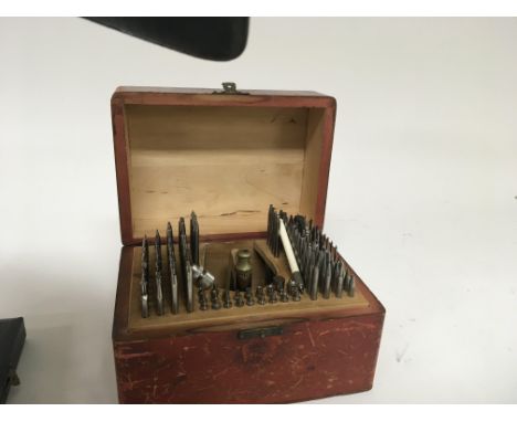 A watchmakers Vintage Conecta Standard staking set tool punch in a fitted case.