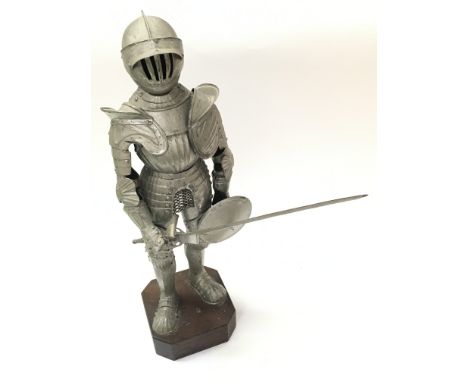 A miniature Medieval suit of armour with longsword and shield , 43cm tall. Postage category C