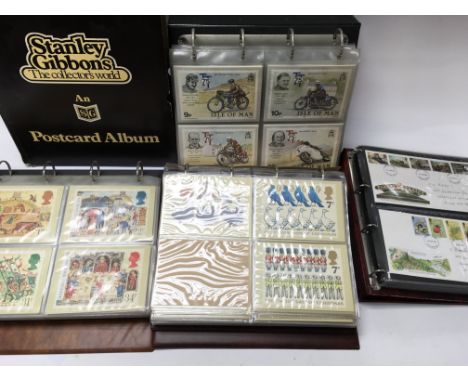 A collection of stamp post cards and an album of first day covers. Postage B