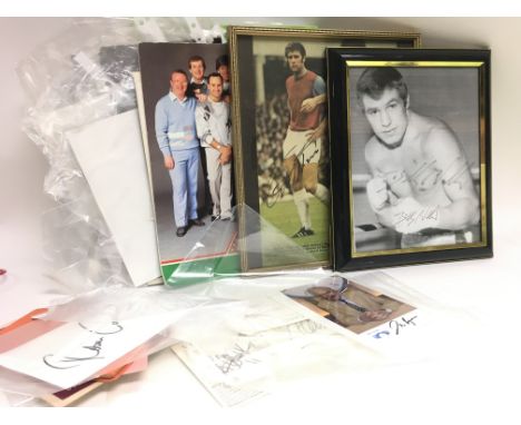 A Collection of autographs of famous athletes including Henry Cooper, Jackie Stewart, Chris Eubank, Justin Fashanu, Vinny Jon