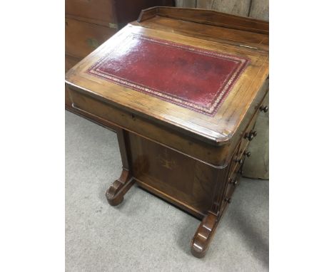 A Victorian walnut Davenport with sloping front fitted with five drawers. NO RESERVE