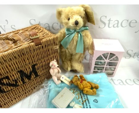 A collection of bears to include a Fortnum & Mason Bear with basket and blanket, Burberry Teddy in box with tag, a miniature 