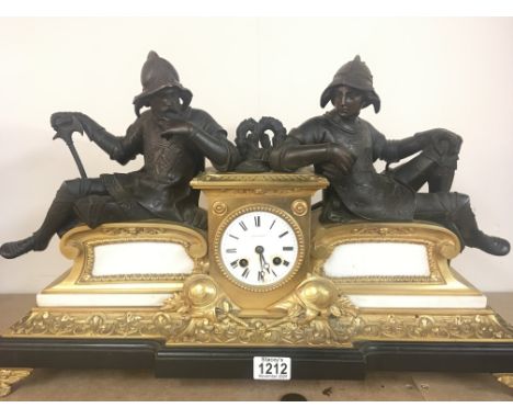 A late 19th century French mantel clock maker LeRoy Paris the gilt metal a d marble vase surmounted with figures of soldiers 