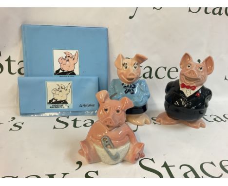 A collection of Wade porcelain pig money banks,