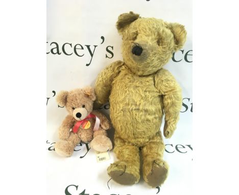 An original Steiff bear Teddybar Flynn 28 and another vintage bigger bear. Postage category c