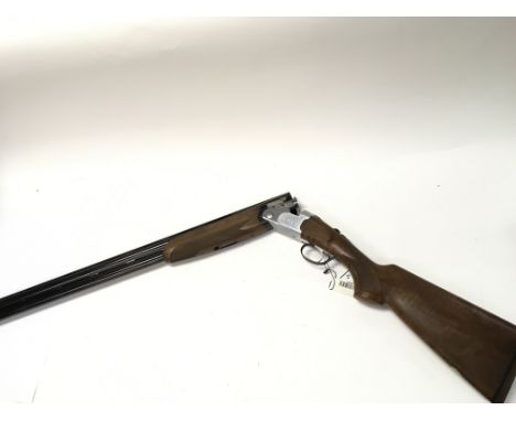 A Beretta 686 S 12g over under shotgun. Single trigger and ejector with chokes. 28inch barrel. Serial number D68354B. PLEASE 