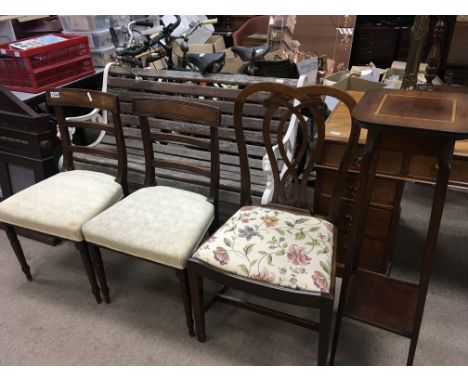 A pair of George III mahogany dining chairs with turned legs one othe late George III chair and an Edwardian plant stand (4) 