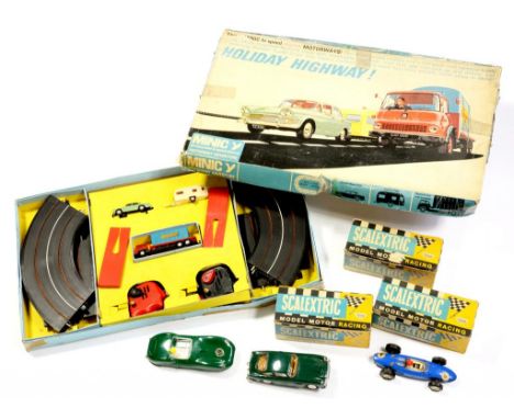 THREE BOXED SCALEXTRIC PLASTIC MOTOR RACING CARS COMPRISING LISTER JAGUAR, ASTON MARTIN AND FERRARI AND A CONTEMPORARY 1960S 