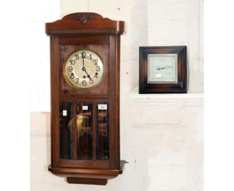 AN OAK WALL CLOCK WITH CHIMING MOVEMENT, 77CM H, EARLY 20TH CENTURY AND AN OAK ANEROID BAROMETER