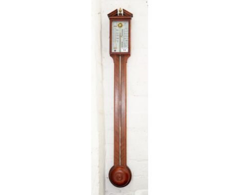 A REPRODUCTION MAHOGANY CISTERN BAROMETER IN 18TH CENTURY STYLE, 93CM H