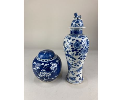 A Chinese porcelain blue and white ginger jar and cover, of bulbous form, decorated with prunus blossom, 14cm high, and a Chi