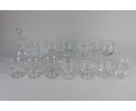 A collection of thirteen 19th century and later clear glass custard cups, including cut glass and etched glass examples, toge