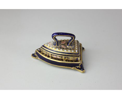 A Royal Crown Derby Imari miniature porcelain model of a flat iron on stand, 7cm