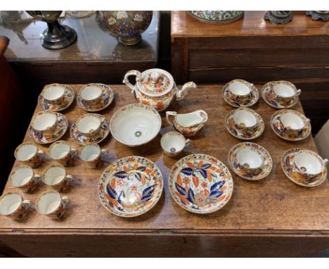 A porcelain 'tobacco leaf' part tea and coffee set, probably Chamberlain's Worcester, most pieces marked 263, decorated in th