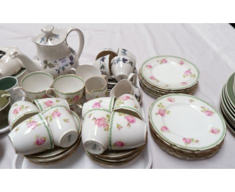 A Royal Doulton "Burgundy" 15 piece coffee set; a 1930's Royal Doulton rose pattern part tea service, 37 pieces approx