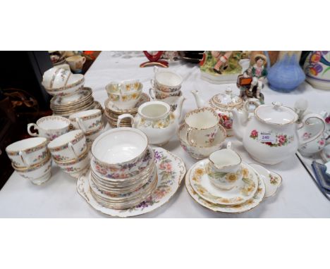 A Paragon "Country Lane" part tea service, 18 pieces approx; a Coalport "Ming Rose" part tea set, 12 pieces approx; other tea