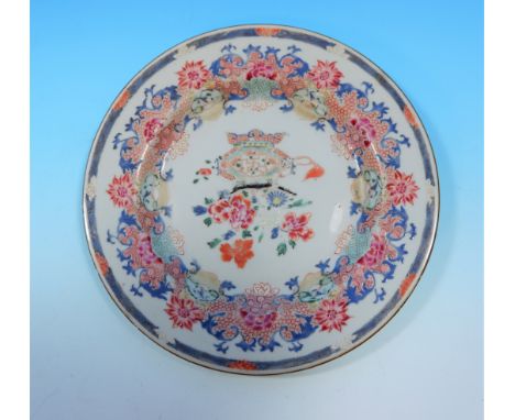 A 19th century Chinese plate with colour enamel decoration, 9"