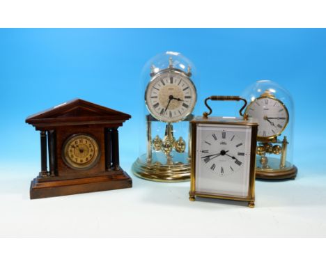 Two 400 day clocks; an Edwardian small architectural clock; a reproduction carriage clock