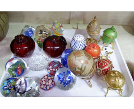 A collection of modern glass paperweights; Fabergé style eggs; etc.