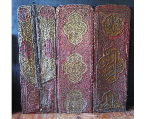 A Victorian three-fold screen, each panel mounted with Persian embroidered tapestry with cartouches  decorated with script. 1