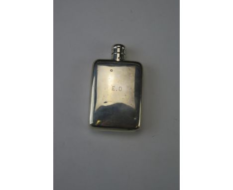 A George V silver hip flask, maker's mark worn, London, 1919, initialled, of plain rectangular form, 11cm wide, 74gms 2.40ozs
