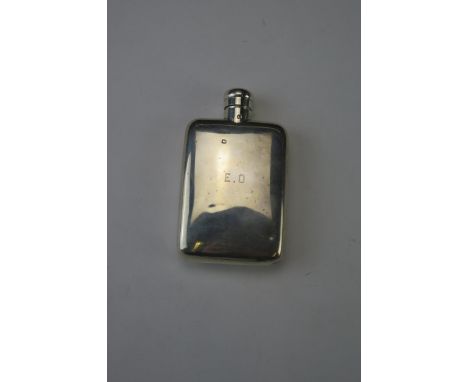 A George V silver hip flask, maker's mark worn, London, 1919, initialled, of plain rectangular form, 11cm wide, 74gms 2.40ozs