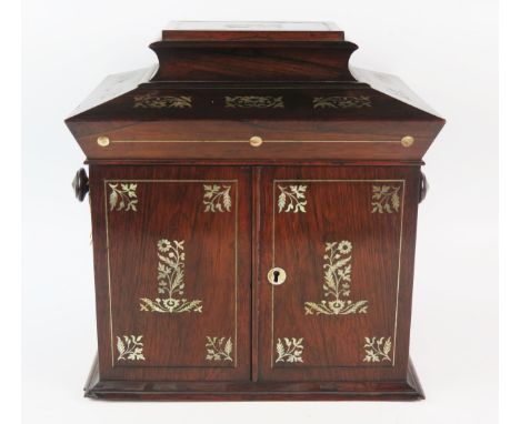 A William IV period rosewood and mother-of-pearl inlaid table top sewing cabinet, with hinged caddy top enclosing a fitted in