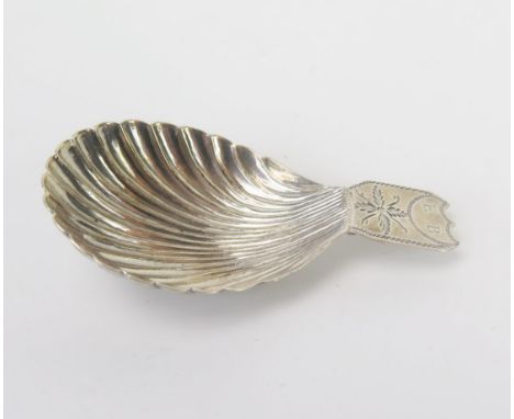 A George III silver caddy spoon, maker Matthew Linwood, Birmingham, 1807, initialled with shell-shaped bowl and chased floral