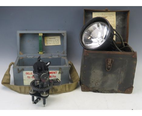 An Air Ministry Astro Compass Mk II, contained in a fitted case, together with an Army Airforce Type C-3A signal lamp in fitt