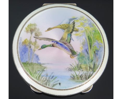 A George Vi silver and enamel powder compact, maker Henry Clifford Davis, Birmingham, 1951, of circular form, the hinged lid 