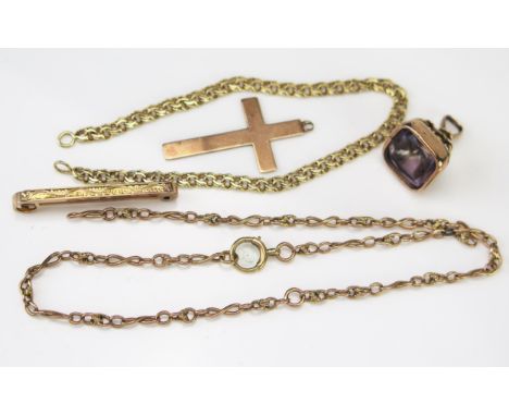 An Edwardian 9ct Gold Cross (Birmingham 1909), 9ct gold tie pin and damaged 9ct gold chain (10.2g), yellow metal chain (3.8g)