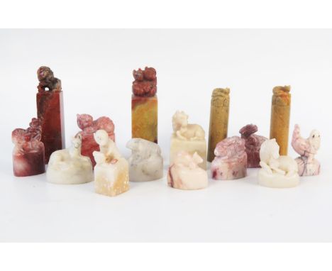 A collection of assorted Chinese carved hardstone seal, of various sizes, most with mythical beast or animal terminals, (15).