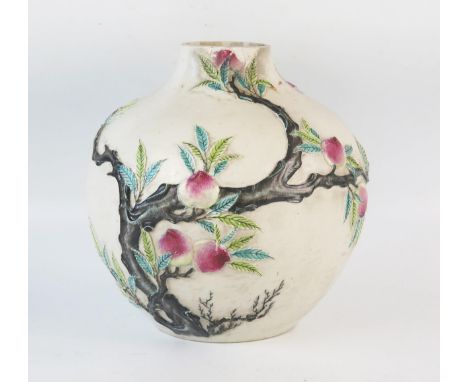 A Chinese pottery bottle vase, of ovoid form, with low relief fruit and foliate decoration, (neck reduced), 25cm high. 