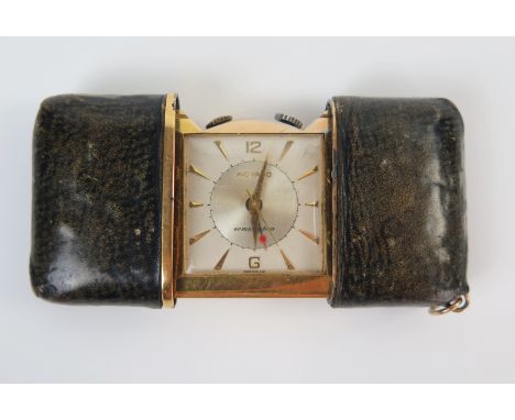 Vintage MOVADO Ermetophon Easel Back Travel Purse Watch with alarm. Metal Dore case stamped 903 895. Running