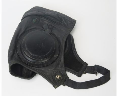 A WWII period American naval black leather flying helmet. 