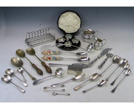 A quantity of assorted plated wares, including eight-division toast rack, set of table salts, cream jug, sugar basin and asso