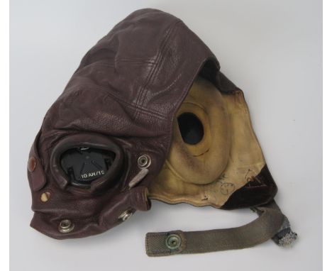A WWII period RAF C-Type brown leather flying helmet, bears P&amp;SW1 stamp serial No 12165, size No 3 7.1/8-7.3/8. 