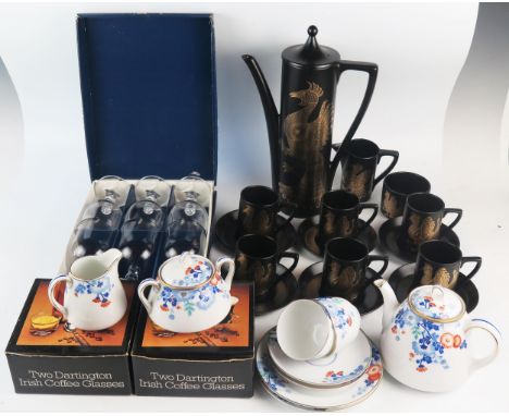 A Portmeirion 'Phoenix' pattern coffee service, a Noritake part tea service, six glass wine goblets, coffee glasses and coffe
